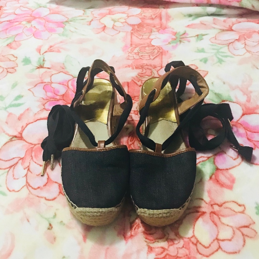 used Michael Kors espadrilles.